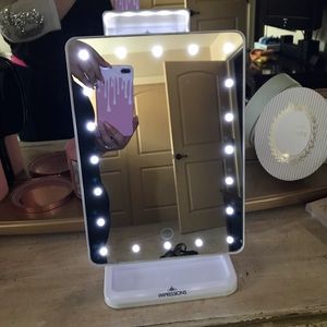 Impressions Vanity touch mirror